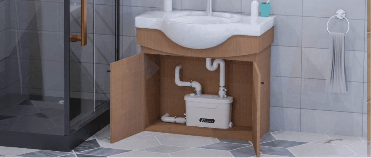 Trooperlift Slim V under-sink wastewater lifting system installation.