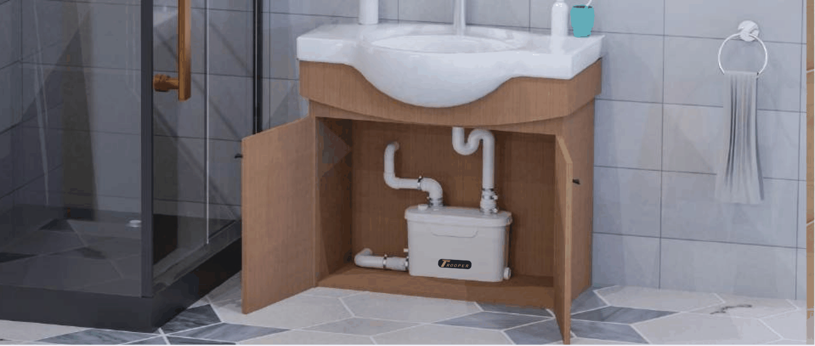 Trooperlift Slim V under-sink wastewater lifting system installation.