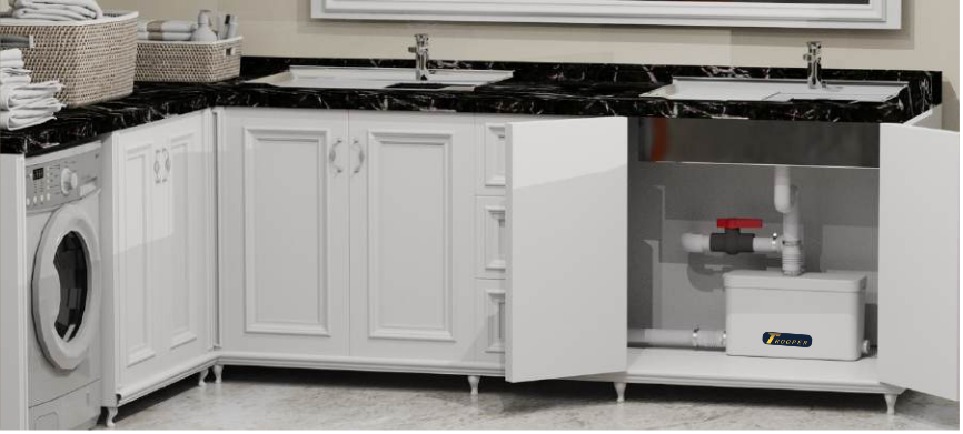 Trooperlift Excel V pump under modern kitchen sink cabinetry.